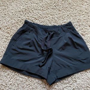 Lululemon black cuff shorts - size 4
